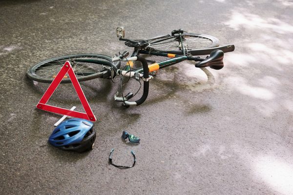 No people. Place of hit. Bicycle accident on the road in forest at daytime